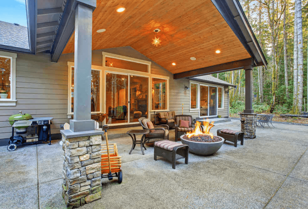 patio resurfacing with outdoor furnitures and fireplace