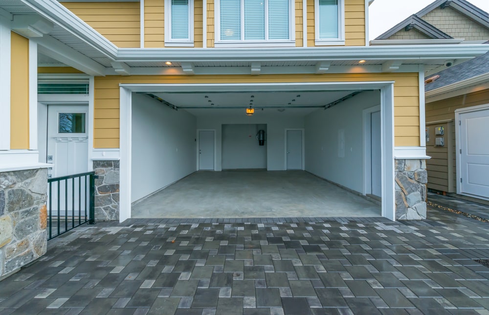 yellow house with garage floor