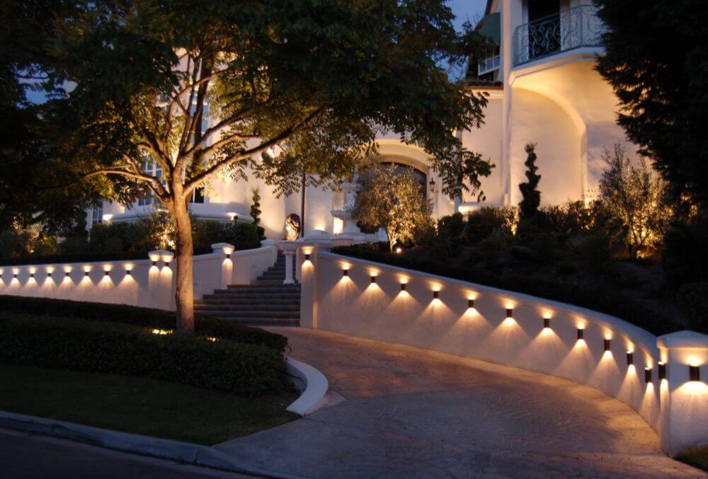 driveway with mounted pathway lights