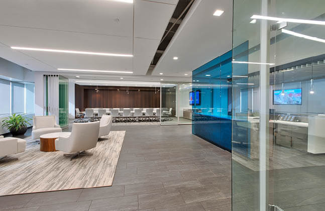 aesthetic office space with chairs and a glass window