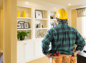 contractor looking at the living room area