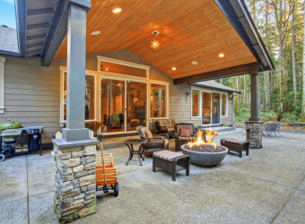 patio with chairs and firepit