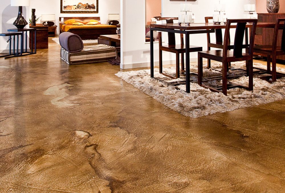 Warm stained concrete flooring in living and dining area