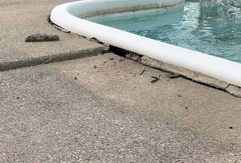 cracked and worn pool deck